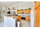 Spacious kitchen featuring granite countertops, stainless steel appliances, and wooden cabinets at 7909 Sierra Rim Dr, Las Vegas, NV 89131
