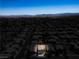 Aerial view showcases a neighborhood with a highlighted property among many similar homes in the community at 81 Alpine Bay Ave, Las Vegas, NV 89148