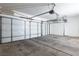 Spacious two-car garage with concrete floor and white door panels, ready for your vehicles and storage needs at 81 Alpine Bay Ave, Las Vegas, NV 89148