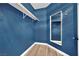 Walk-in closet featuring fresh paint and new flooring at 8408 White Eagle Ave # 101, Las Vegas, NV 89145