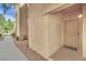 Inviting entrance with secure gate, desert landscaping, and well-maintained walkway at 8408 White Eagle Ave # 101, Las Vegas, NV 89145