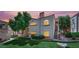 Charming multi-Gathering home with lush lawn, mature trees, and beautiful sunset lighting at 8408 White Eagle Ave # 101, Las Vegas, NV 89145