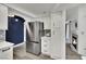 Contemporary kitchen with stainless steel refrigerator, modern finishes, and open layout at 8408 White Eagle Ave # 101, Las Vegas, NV 89145