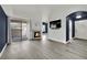 Bright living room featuring fireplace, slider, and modern decor, ready for relaxation at 8408 White Eagle Ave # 101, Las Vegas, NV 89145