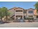 Inviting exterior view of a two-story condo building with well-maintained landscaping and easy access stairs at 8450 Alta Dr # 225, Las Vegas, NV 89145