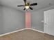 Welcoming bedroom with plush carpeting, ceiling fan, and generous closet space at 8728 Tom Noon Ave # 103, Las Vegas, NV 89178