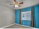 Comfortable bedroom with a ceiling fan and large windows at 8728 Tom Noon Ave # 103, Las Vegas, NV 89178