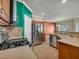 Modern kitchen with stainless steel appliances and an eat-in area at 8728 Tom Noon Ave # 103, Las Vegas, NV 89178