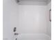 Well-maintained bathroom showcasing a shower and tub with white tile surround at 912 Falconhead Ln # 101, Las Vegas, NV 89128
