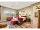 Cozy bedroom featuring natural light, neutral tones, and stylish furnishings, offering a tranquil retreat at 964 Edinburgh Fields Ct, Las Vegas, NV 89138