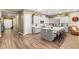 Spacious kitchen with white cabinets, a large island, and stainless steel appliances, perfect for entertaining at 964 Edinburgh Fields Ct, Las Vegas, NV 89138