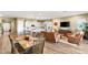 Open concept living space featuring a modern kitchen, dining area, and comfortable living room setup at 964 Edinburgh Fields Ct, Las Vegas, NV 89138