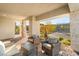 Inviting patio with brick flooring and comfortable seating at 964 Edinburgh Fields Ct, Las Vegas, NV 89138