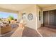 Inviting porch with brick flooring and comfortable seating at 964 Edinburgh Fields Ct, Las Vegas, NV 89138