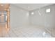 Bright living room features tile flooring and multiple windows for natural light at 9717 Villa Lorena Ave, Las Vegas, NV 89147