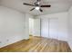 Bedroom showcasing wood floors, doors to closet and doorway at 9966 Mystic Moss St, Las Vegas, NV 89183
