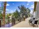 Relaxing outdoor patio with seating and views of lush landscaping at 9966 Mystic Moss St, Las Vegas, NV 89183