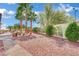Low-maintenance backyard with desert landscaping and ample space for outdoor enjoyment at 10001 Cresent Creek Dr, Las Vegas, NV 89134