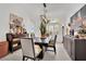 Elegant dining room with modern decor, stylish furniture, and plenty of natural light at 10001 Cresent Creek Dr, Las Vegas, NV 89134
