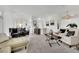 Bright and airy living room with modern decor and comfortable seating arrangements at 10001 Cresent Creek Dr, Las Vegas, NV 89134