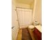 Simple bathroom with neutral tones, standard fixtures, and a shower with curtain at 10553 Pine Glen Ave # 202, Las Vegas, NV 89144
