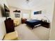 Bedroom with neutral carpet, natural light, and simple decor at 10553 Pine Glen Ave # 202, Las Vegas, NV 89144