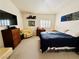 Bedroom with neutral carpet, natural light, and simple decor at 10553 Pine Glen Ave # 202, Las Vegas, NV 89144