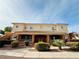 Attractive two-story condo building with well-kept landscaping, red tile roof, and clearly marked unit numbers at 10553 Pine Glen Ave # 202, Las Vegas, NV 89144