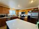 Bright kitchen with stainless steel appliances, an island, and lots of natural light at 10553 Pine Glen Ave # 202, Las Vegas, NV 89144
