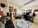 Living room with a neutral carpet, a couch, a rug, and some art at 10553 Pine Glen Ave # 202, Las Vegas, NV 89144