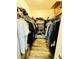 Walk-in closet with laminate floors, shelving, and organized storage at 10553 Pine Glen Ave # 202, Las Vegas, NV 89144