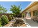Charming backyard with covered patio and water fountain, perfect for outdoor living at 11073 Gateview Ln, Las Vegas, NV 89144