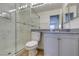 Clean bathroom with a glass shower and vanity sink at 11073 Gateview Ln, Las Vegas, NV 89144
