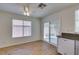 Bright kitchen leading to the patio through sliding glass doors at 11073 Gateview Ln, Las Vegas, NV 89144