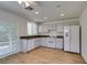 Bright kitchen offers hardwood floors, granite countertops, and a complete appliance set at 11073 Gateview Ln, Las Vegas, NV 89144