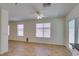 A bright living room space showcasing wood flooring at 11073 Gateview Ln, Las Vegas, NV 89144