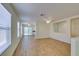 Bright living room with wood-look floors and natural light at 11073 Gateview Ln, Las Vegas, NV 89144