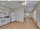 An open-concept living room showcases wood flooring and ample natural light at 11073 Gateview Ln, Las Vegas, NV 89144