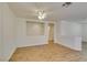 Bright living room features hardwood floors and clear view to the adjacent rooms at 11073 Gateview Ln, Las Vegas, NV 89144