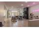 Open concept living room with tile floors and neutral wall color at 11244 Gammila Dr, Las Vegas, NV 89141