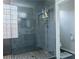 Modern shower featuring glass enclosure, sleek hardware, and easy access to the toilet at 11244 Gammila Dr, Las Vegas, NV 89141