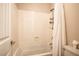 Clean bathroom featuring a shower-tub combo and white fixtures at 12124 Kite Hill Ln, Las Vegas, NV 89138