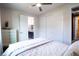 Bright bedroom with an ensuite bathroom, closet space, and bright walls at 12124 Kite Hill Ln, Las Vegas, NV 89138