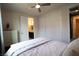 Bright bedroom with an ensuite bathroom, closet space, and bright walls at 12124 Kite Hill Ln, Las Vegas, NV 89138