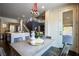 The open concept dining area has staircase views to the second floor at 12124 Kite Hill Ln, Las Vegas, NV 89138