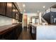 The modern kitchen features a large center island and built-in appliances at 12124 Kite Hill Ln, Las Vegas, NV 89138