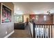 This loft space features brick accents, modern decor, and comfortable seating at 12124 Kite Hill Ln, Las Vegas, NV 89138