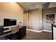The office space features a computer desk, neutral paint, and modern decor at 12124 Kite Hill Ln, Las Vegas, NV 89138