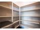 Walk in pantry featuring generous shelving with lots of storage space at 12124 Kite Hill Ln, Las Vegas, NV 89138