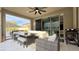 Inviting covered patio with outdoor furniture and a view of the backyard at 12428 Lincoln Creek Ave, Las Vegas, NV 89138